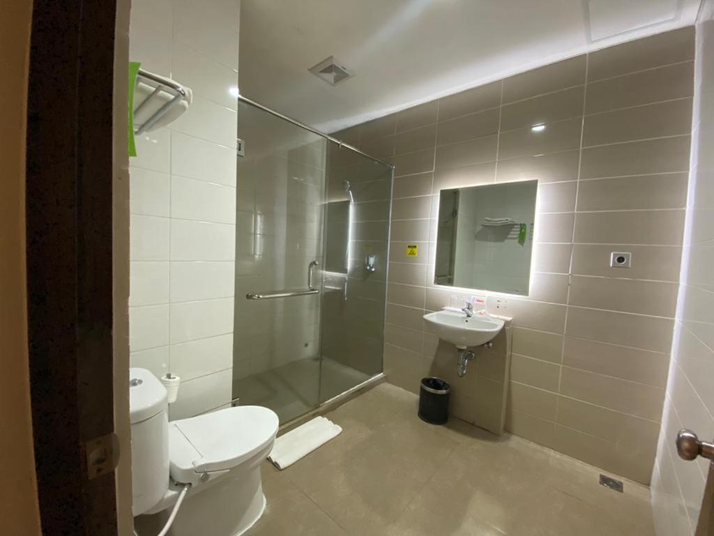 Opi Indah Hotel Palembang Buitenkant foto