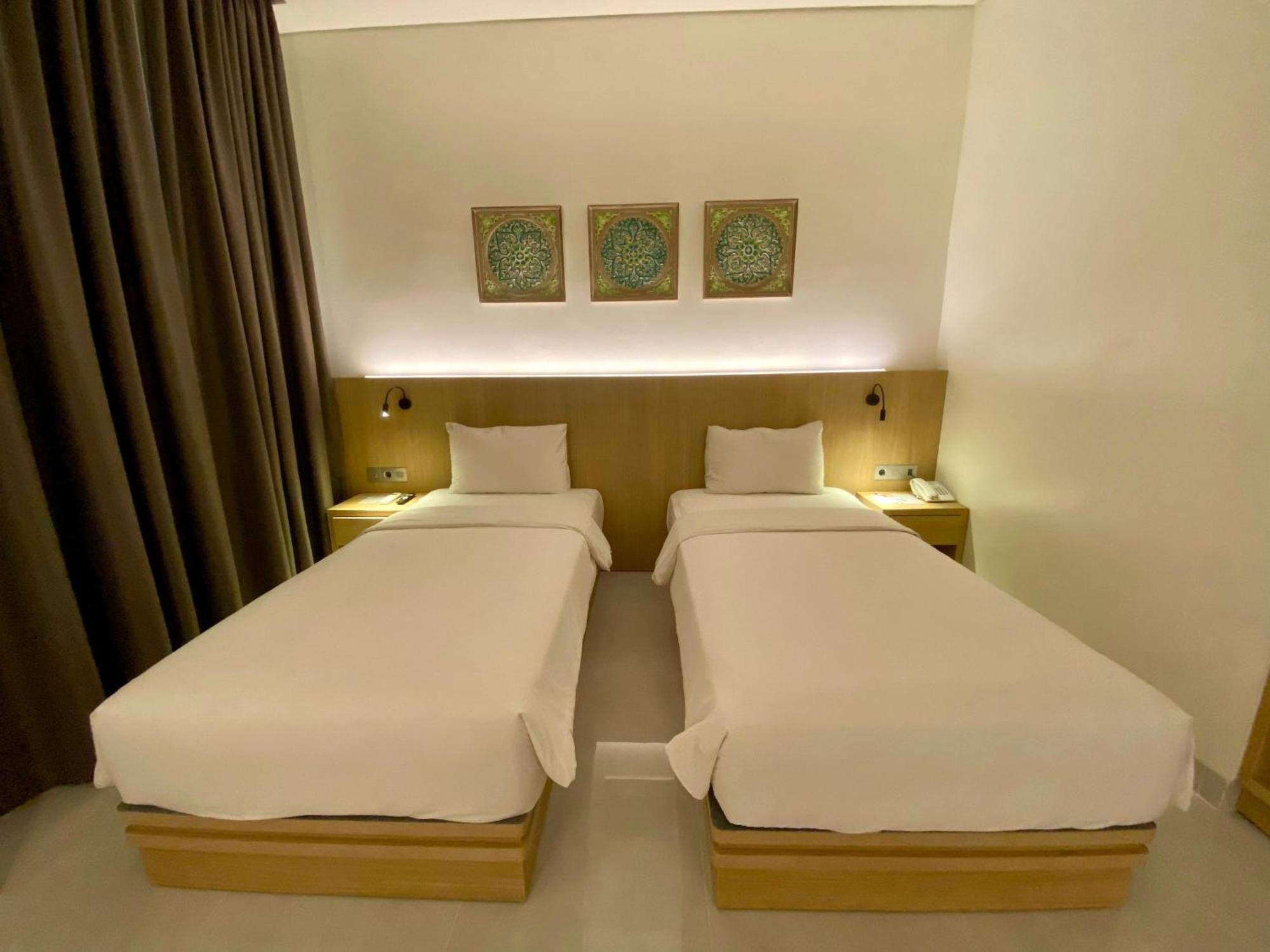 Opi Indah Hotel Palembang Buitenkant foto