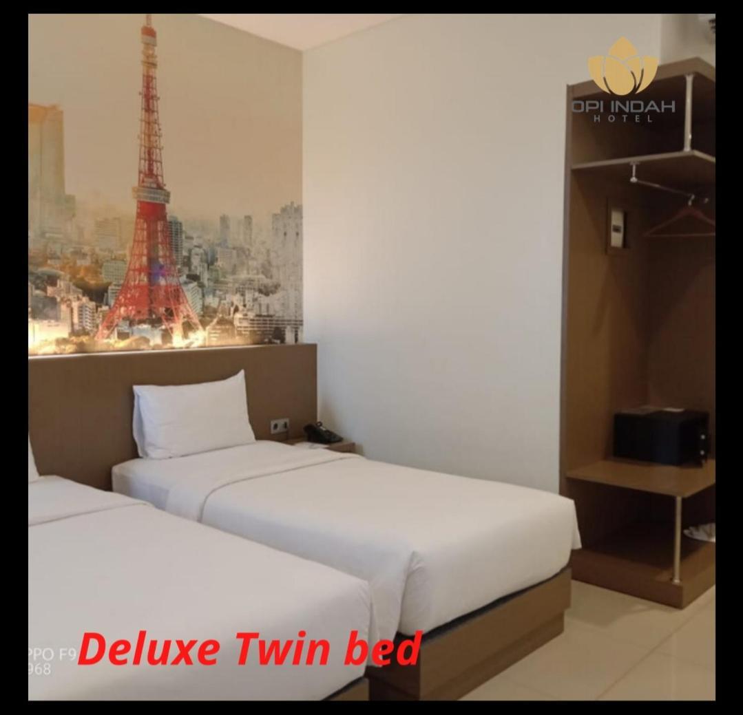 Opi Indah Hotel Palembang Buitenkant foto