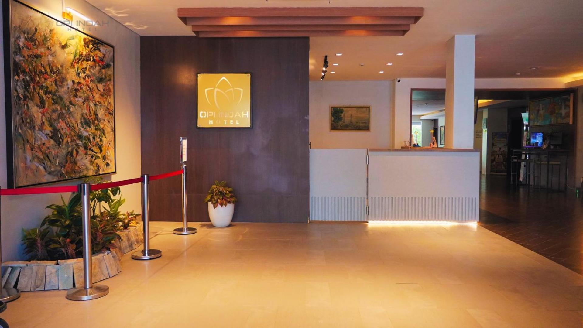 Opi Indah Hotel Palembang Buitenkant foto